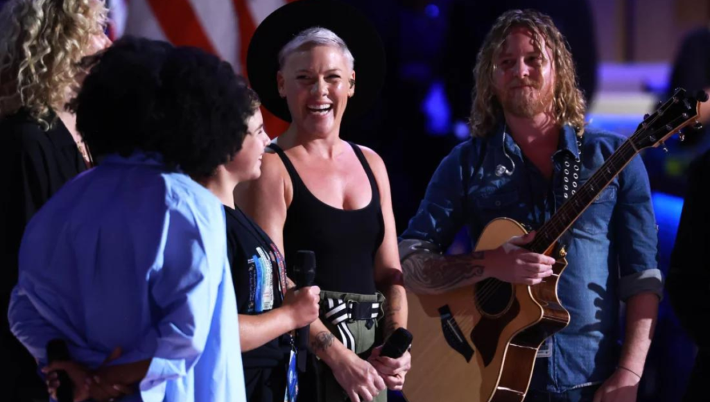 Pink and her daughter were undeterred by the DNC rally's chant of "What do we say?"