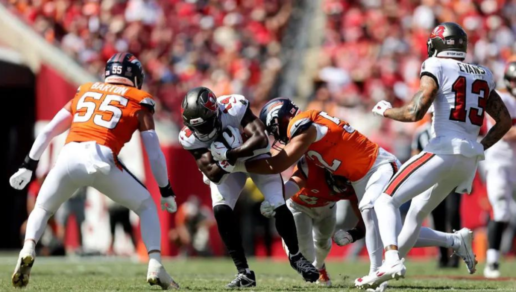 Nix ran for a TD, Lutz hit four field goals and the Broncos beat the listless Buccaneers 26-7.